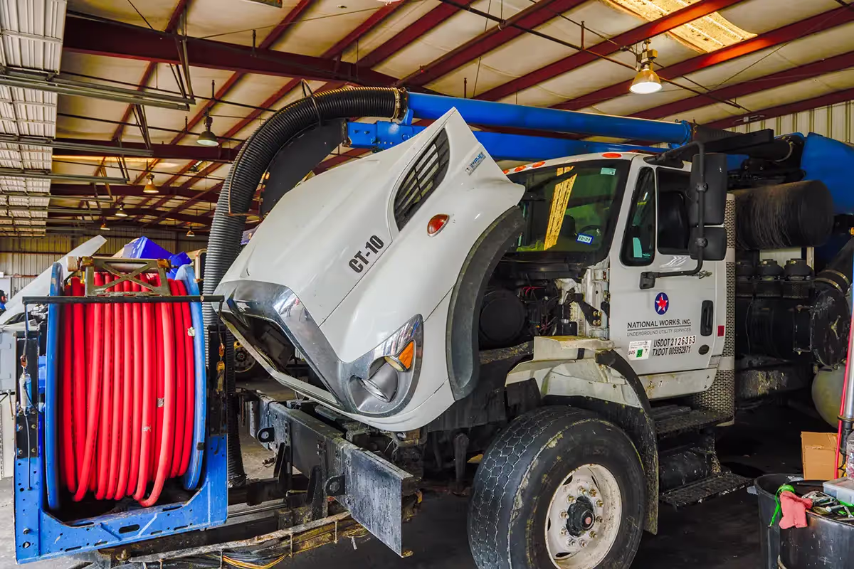 Mechanic performing heavy equipment repairs in Texas
